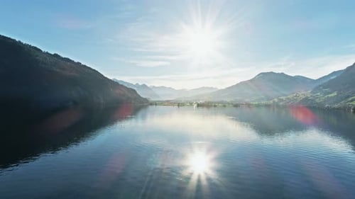 Flight Over a Mountain Lake at Sunset Switzerland Europe Above