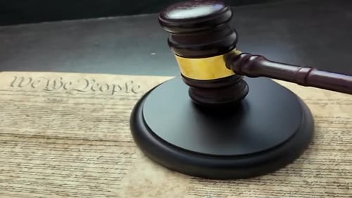 Judicial Gavel Resting on the United States Constitution