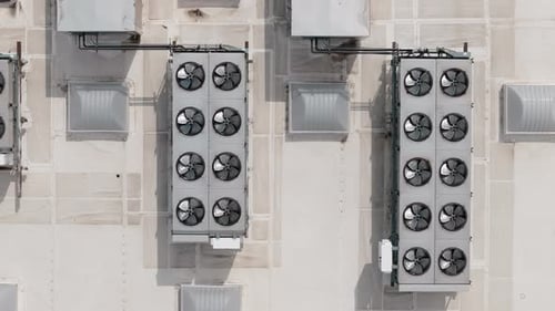 Big Industrial HVAC Air Conditioner System on the Roof Above Shot View