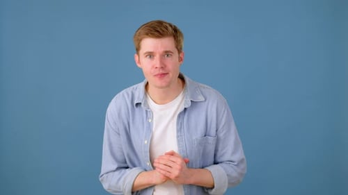 Young Man Pumping Fists in Celebration