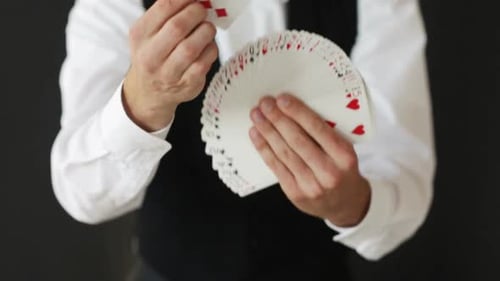Magic, Card Tricks, Gambling, Casino, Poker Concept - Man Showing Trick With Playing Cards