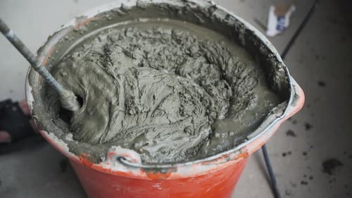 Grout Being Mixed with a Drill