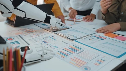 Business Team Discussing Data with Robot Arm