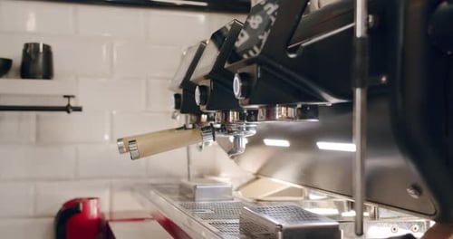 Pouring Coffee Stream From Machine in Cup Espresso in a White Cup Tasty Coffee