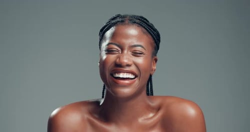Skincare, smile and face of black woman in studio with health, beauty and facial glow