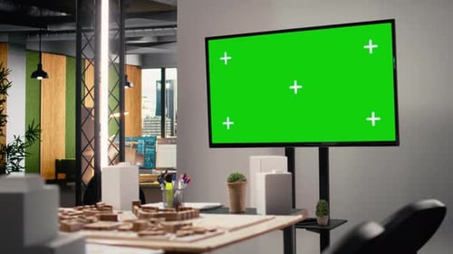 Empty Real Estate Office with a Huge Isolated Green Screen TV in Innovation Hub