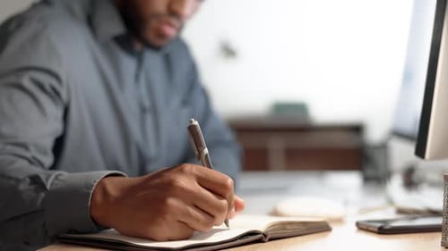Closeup, business and man planning, writing and notes for feedback, review