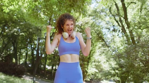 Athletic Fit Runner Girl Celebrate Success Win Scream Rejoices Triumph Victory Marathon Race in Park