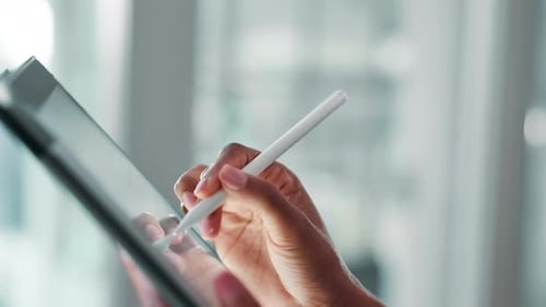 Hands Using Stylus On Tablet Device