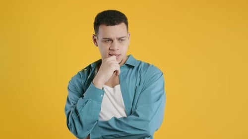 Thoughtful Around Hipster Man on Yellow Confused Student Guy Finding Answer