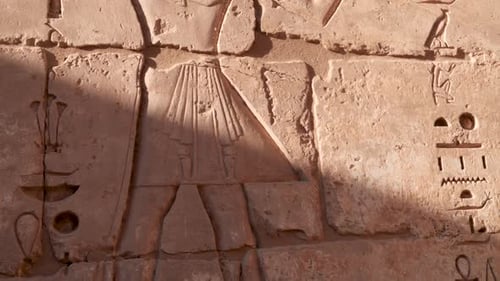 Detail of hieroglyphs inside Habu Temple, Luxor, Egypt.