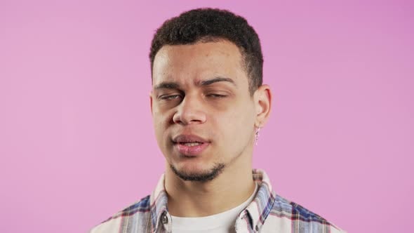 Man Showing Confused Expression on Pink Background, People Stock ...