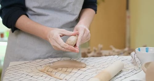 Woman Forming Clay Pot Shape By Hands Closeup in Artistic Studio