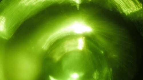 Illuminate Collection: Sci-Fi light leak transition with a clockwise green flare