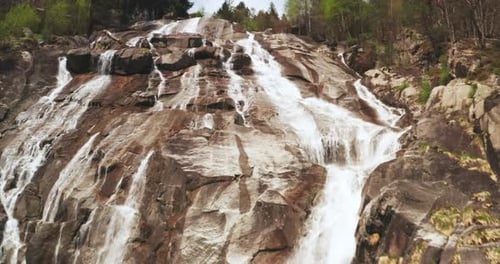 Aerial of scenic waterfalls panoramic view surrounded by nature in a magical, relaxing and green p