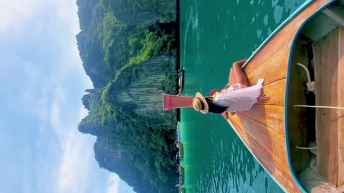 Pileh Lagoon with Green Emerald Ocean at Koh Phi Phi Thailand Women in Front of Longtail Boat