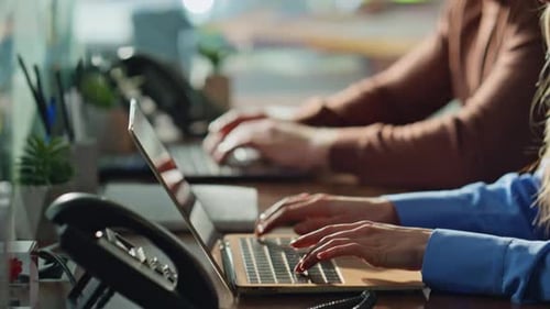 Coworkers Hands Typing Laptop in Office Workspace Closeup Managers Working