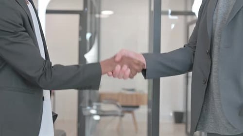 Close up of Business People Shaking Hand