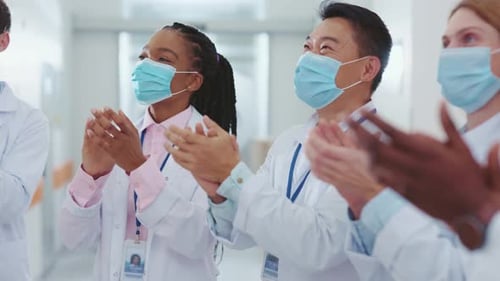 Healthcare Professionals Sharing a Joyous Celebration Together at a Hospital Facility