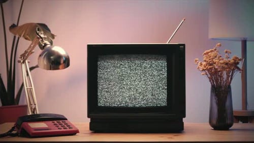 Hand Turns Off Retro Television Static Screen