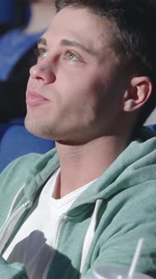 Animated Conversation Between a Young Man and Woman About a Film