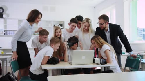 Teens Using VR Headset in Classroom Setting