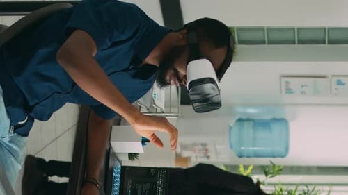 Man Using VR Headset in Modern Office