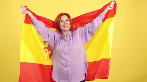 Woman Celebrates with Spanish Flag