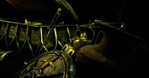 Ancient Treasures and Artifacts Displayed in a Dark Setting