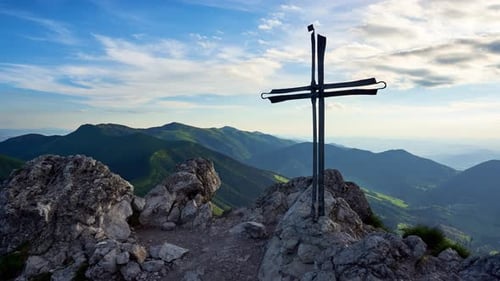 Christian Cross on the Top of Limestone Mountain Panoramic View of the Mountain ridgeTimelapse