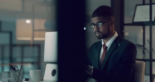 Laptop, burnout and tired businessman working at night in an office frustrated by deadline