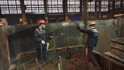 Foundry Workers Preparing Sand Mold Stock Clip
