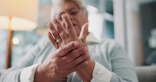 Senior Massaging Hands for Joint Pain Relief