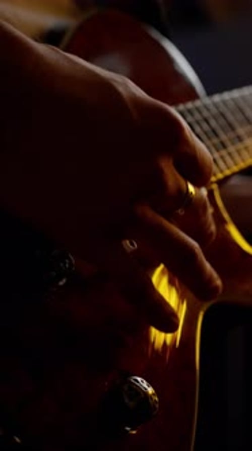 Hands Playing Electric Guitar Close Up