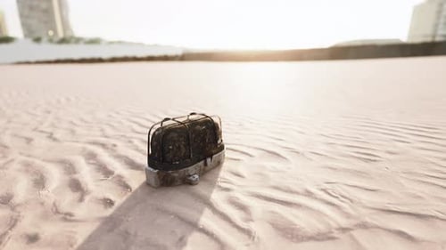 Old Rusted Trash on the Sand Beach