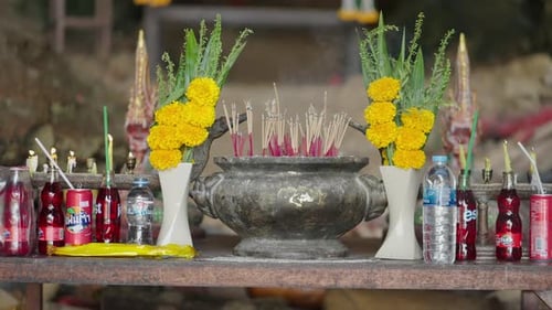 Decorative Table with Incense and Beverages