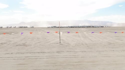 Driving Past Flagged Road in Nevada Desert