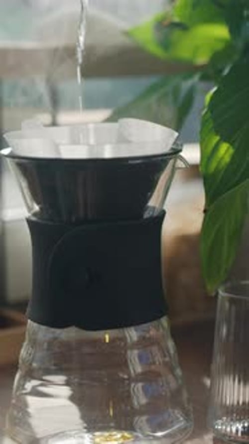 Hot Water Pouring Into Coffee Pour Over Device