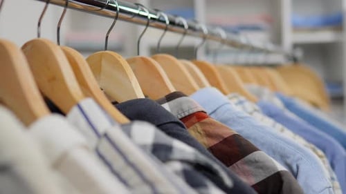 Men's Shirts Hanging Neatly in Closet