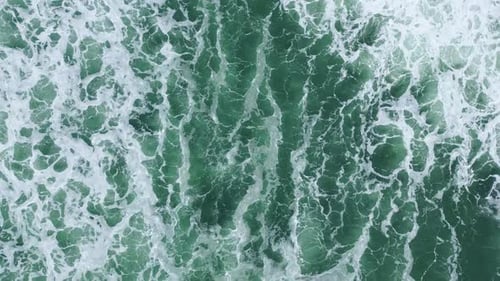 Powerful Sea Waves Foaming Drone Top View. Stormy Grey Water Making White