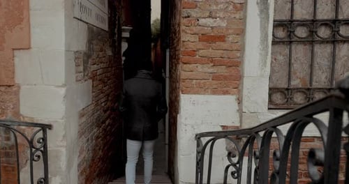 Man Ventures Into Venice's Narrow Alleyways