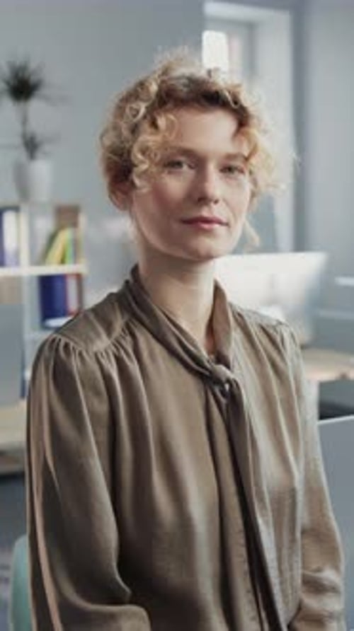 Portrait of Smiling Female Company Owner in Background of Modern Cozy Office Footage of Gorgeous