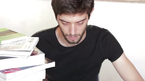 Male college student using tablet computer