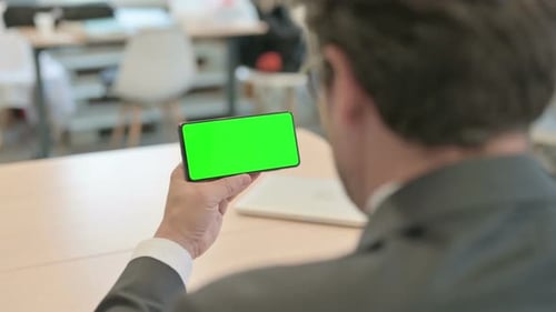 Businessman Using Smartphone with Chroma Key