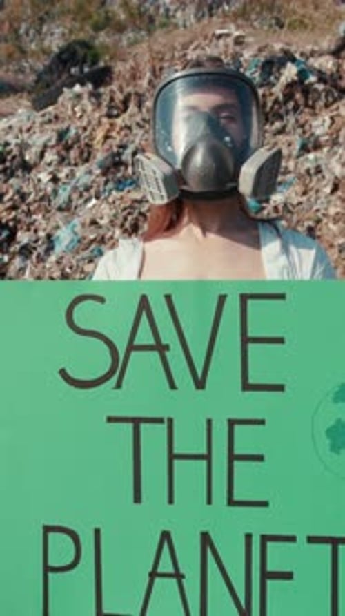 Woman with Gas Mask Holding 'Save the Planet' Sign