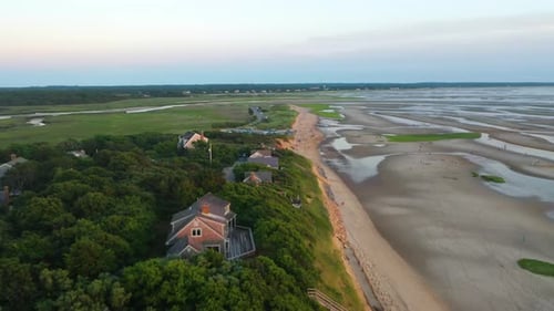 Cape Cod Bay Aerial Drone Footage of Bay Side Beach at Low Tide with Sand Dunes, Marsh and People Wa