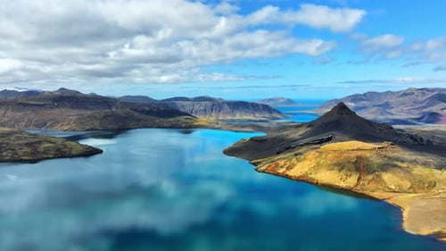 Picturesque Reflection of Clouds in Clear Glacial Water Huge High Mountain Lake Scenic Drone Aerial