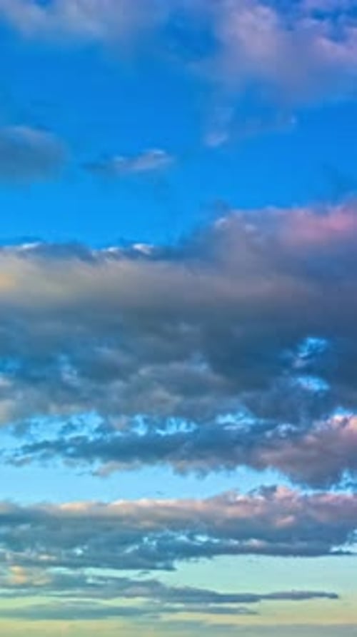 Timelapse of Gorgeous Clouds Drifting Against a Vibrant Blue Sky