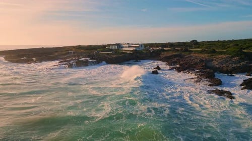 Aerial View Stony Coastline Washing By Stormy Ocean Sea Waves Splashing Cliffs