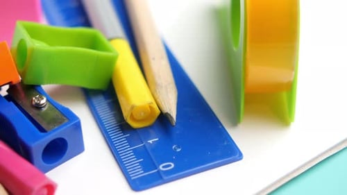 Colorful School Materials Displayed on a Clean Surface